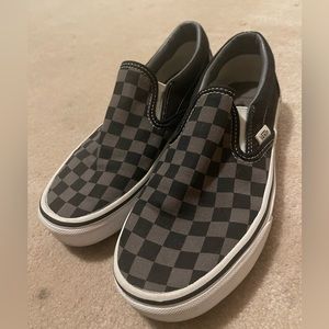 Women’s black and dark grey checkered Vans